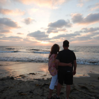 a couple watching the sunset