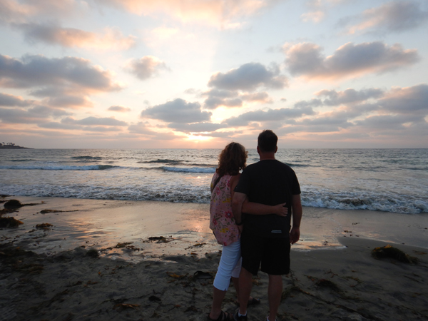 a couple watching the sunset